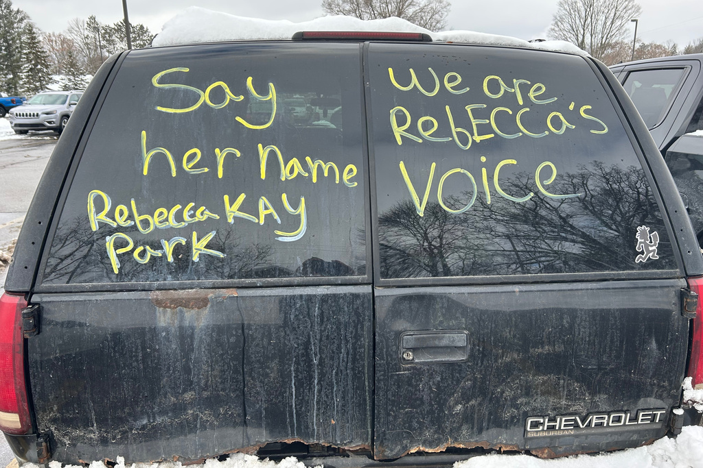 Messages of support for Rebecca Park are written on a vehicle parked at district court prior to the arraignment for Cortney and Bradley Bartholomew, Tuesday, Dec. 2, 2025, in Wexford County, Mich. (Gus Burns/The Grand Rapids Press via AP)