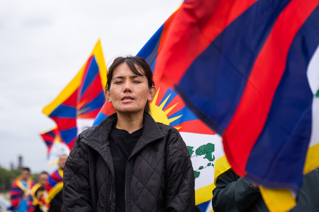 Pro-Tibet independence protestors demonstrate near the U.S. Capitol while China's President Xi Jinping visits the White House, Thursday, Sept. 24, 2026, in Washington. (AP Photo/Allison Robbert)