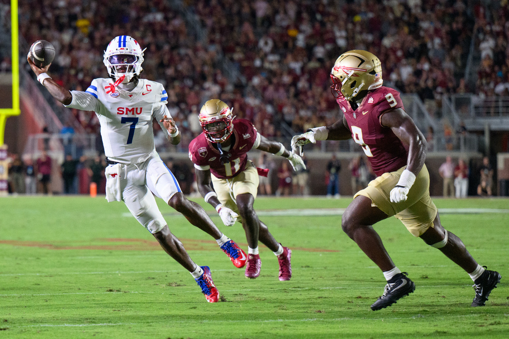 SMU quarterback Kevin Jennings (7) looks to throw during the first half of an NCAA college football game against Florida State, Monday, Sept. 7, 2026, in Tallahassee, Fla. (AP Photo/Noah Lantor)