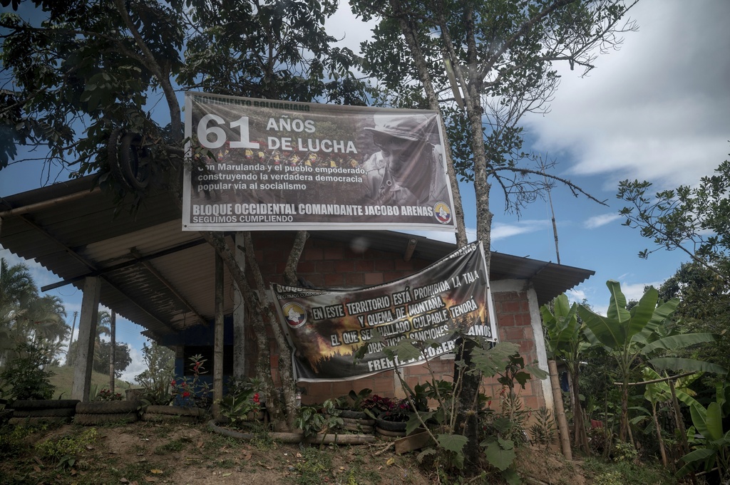 Banners on the side of the road for the Dagoberto Ramos armed group are displayed on July 18, 2025, in Caldono, Colombia. (AP Photo/Nadège Mazars)