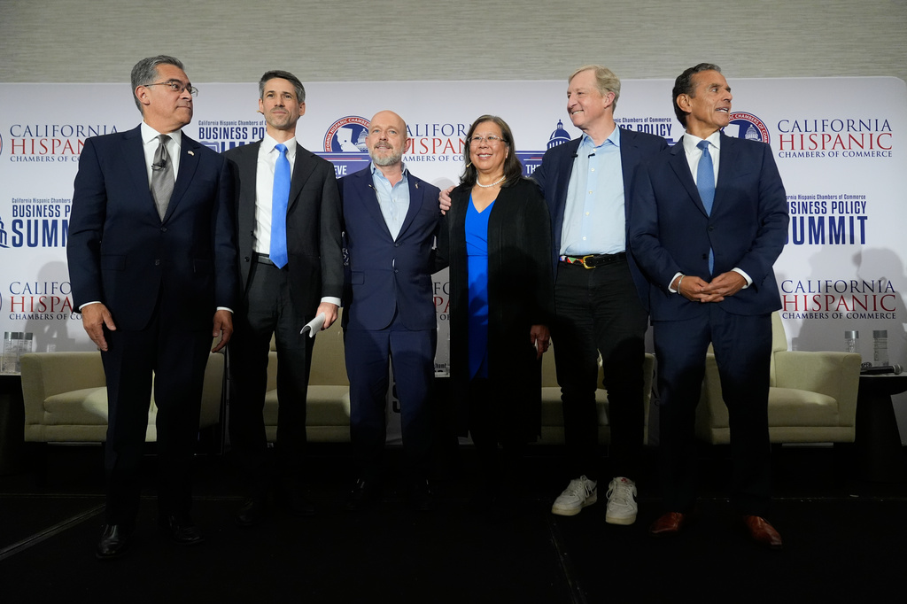 From left, Xavier Becerra, Matt Mahan, Steve Hilton, Betty Yee, Tom Steyer and Antonio Villaraigosa pose during a gubernatorial candidate forum in Sacramento, Calif., Tuesday, April 14, 2026. (AP Photo/Godofredo A. Vásquez)