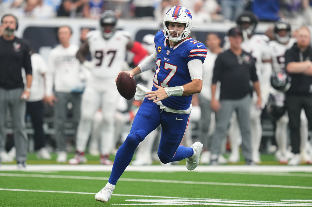 Buffalo Bills quarterback Josh Allen (17) runs the ball against the Houston Texans during the first half of an NFL football game, Sunday, Sept. 13, 2026, in Houston. (AP Photo/Eric Christian Smith)