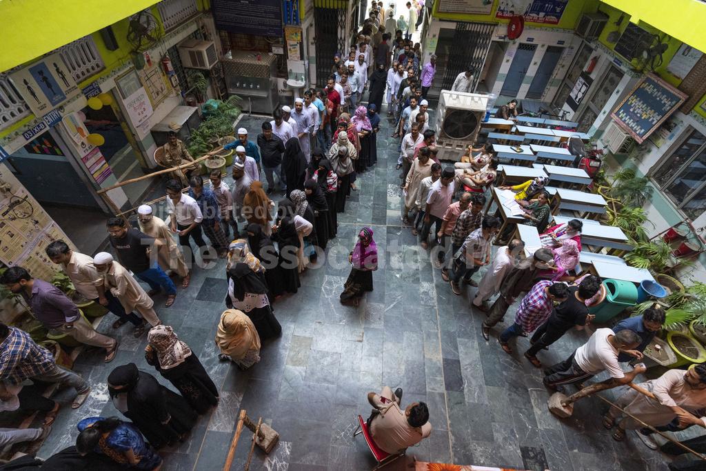 Millions vote in India's grueling election with Prime Minister Modi's ...