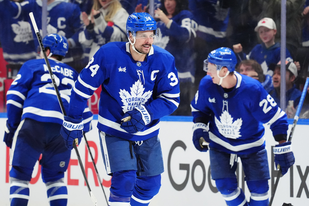 Toronto Maple Leafs' Auston Matthews (34) celebrates his goal against the Winnipeg Jets during the third period of an NHL hockey game in Toronto on Thursday, Jan. 1, 2026. (Frank Gunn/The Canadian Press via AP)