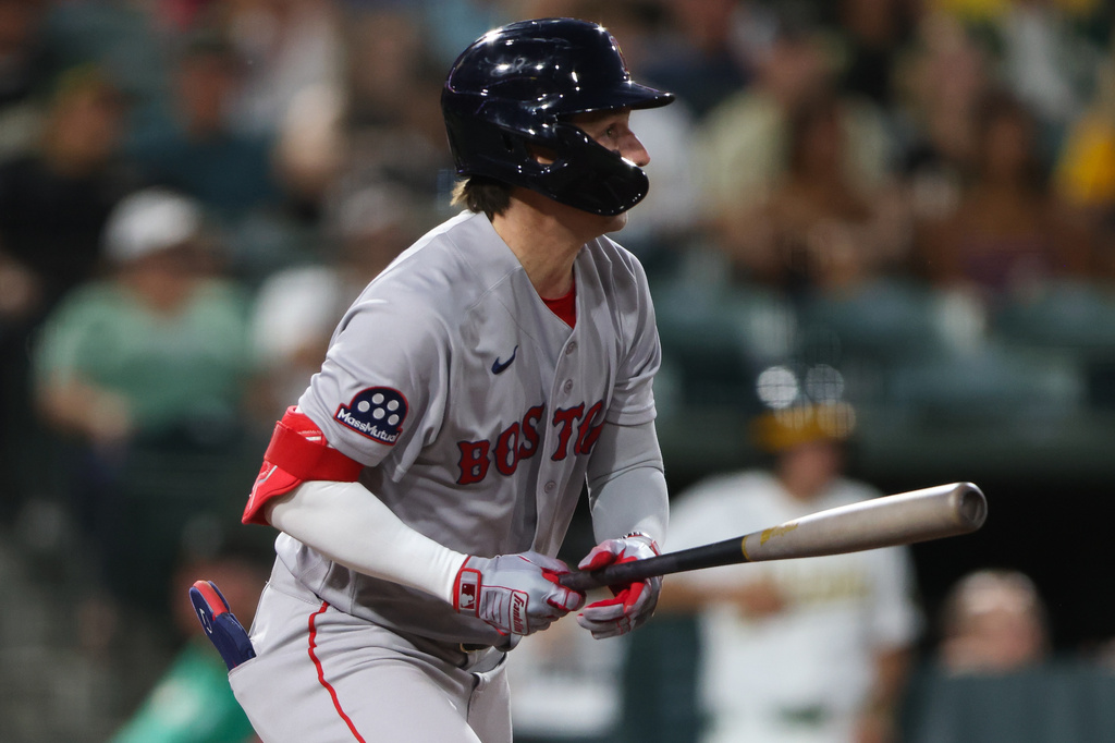 Boston Red Sox's Nick Sogard hits an RBI single during the sixth inning of a baseball game against the Athletics Wednesday, July 29, 2026, in West Sacramento, Calif. (AP Photo/Scott Marshall)