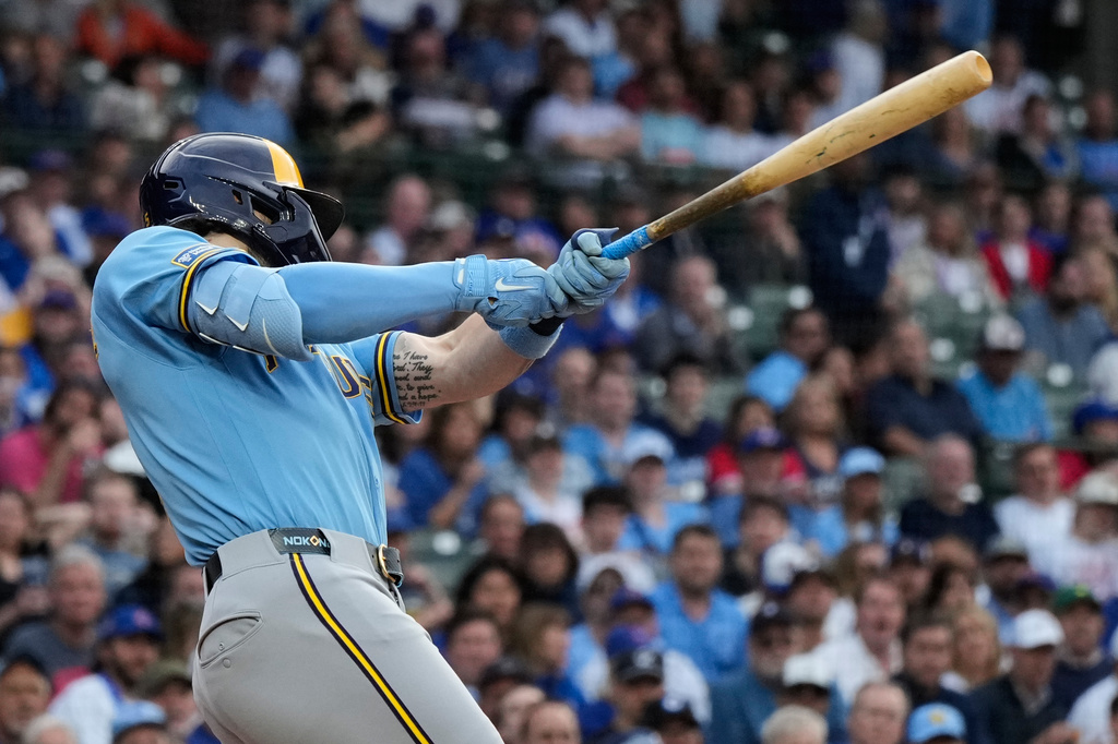 Milwaukee Brewers' Garrett Mitchell hits a one-run single during the first inning of a baseball game against the Chicago Cubs in Chicago, Tuesday, May 19, 2026. (AP Photo/Nam Y. Huh)