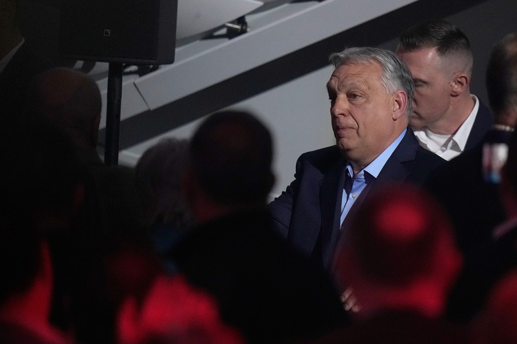 Hungary's Prime Minister Viktor Orban leaves the podium after speaking after a parliamentary election in Budapest, Hungary, Sunday, April 12, 2026. (AP Photo/Petr David Josek)