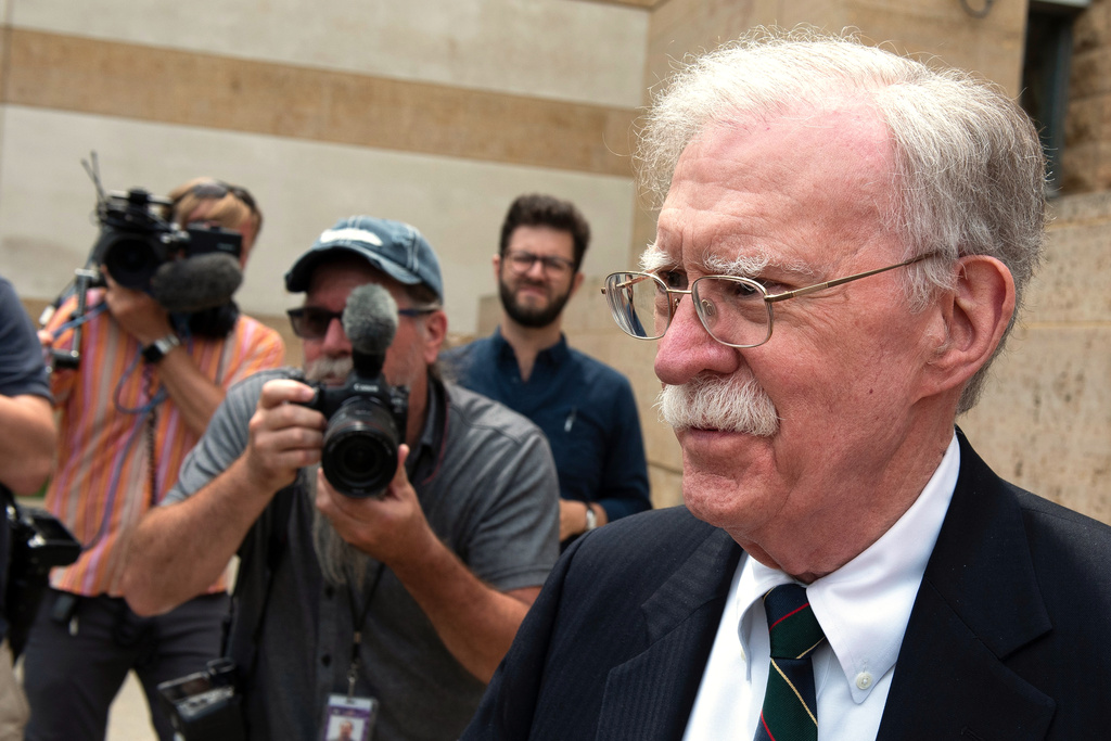 Former Trump administration national security adviser John Bolton departs the U.S. District Court in Greenbelt, Md., Friday, June 26, 2026. (AP Photo/Cliff Owen)