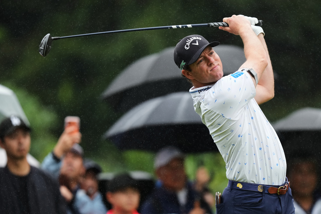Max Greyserman, of the U.S., tees off on the second hole during the third round of the Baycurrent Classic golf tournament at the Yokohama Country Club in Yokohama, near Tokyo, Saturday, Oct. 11, 2025. (AP Photo/Hiro Komae)