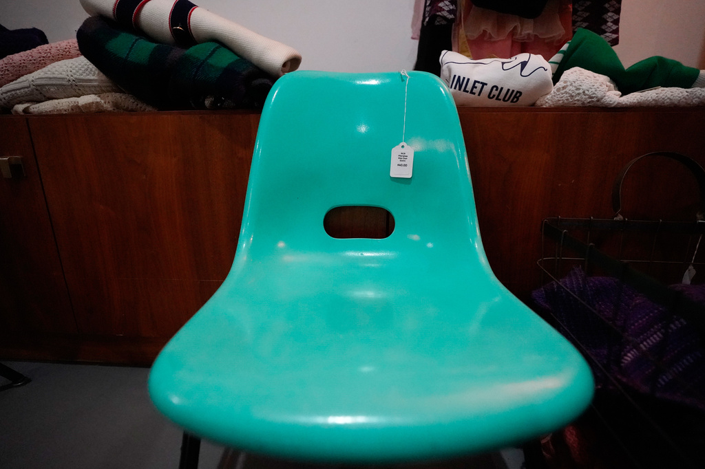 A chair is for sale at Mothership, a vintage and thrift store, Thursday, March 26, 2026, in New York. (AP Photo/Alyssa Goodman)