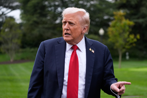 President Donald Trump speaks with reporters as he walks from Marine One after arriving on the South Lawn of the White House, Tuesday, Sept. 30, 2025, in Washington. (AP Photo/Alex Brandon) President Donald Trump speaks with reporters as he walks from Marine One after arriving on the South Lawn of the White House, Tuesday, Sept. 30, 2025, in Washington. (AP Photo/Alex Brandon)