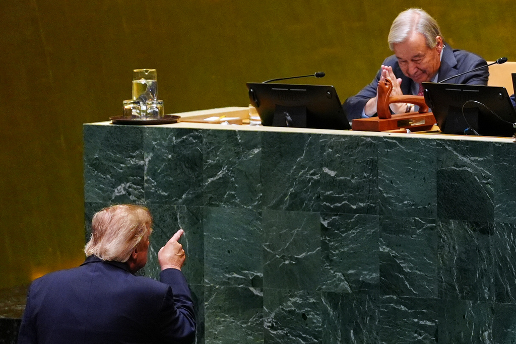 President Donald Trump points toward United Nations Secretary-General Antonio Guterres, after speaking to the United Nations General Assembly, Tuesday, Sept. 22, 2026, at the UN headquarters. (AP Photo/Julia Demaree Nikhinson)