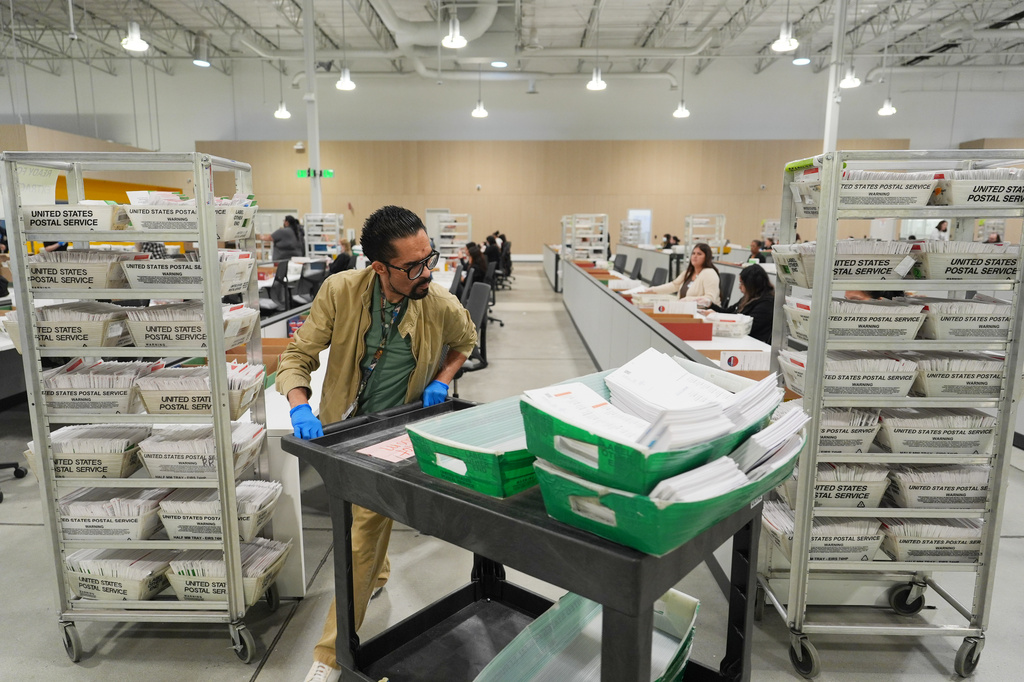 FILE - Ballots are sorted the day after California's primary election at the LA County Ballot Processing Center, June 3, 2026, in City of Industry, Calif. (AP Photo/Jae C. Hong, File)