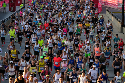 Runners participate in the Chicago Marathon, Sunday, Oct. 12, 2025. (AP Photo/Nam Y. Huh) Runners participate in the Chicago Marathon, Sunday, Oct. 12, 2025. (AP Photo/Nam Y. Huh)