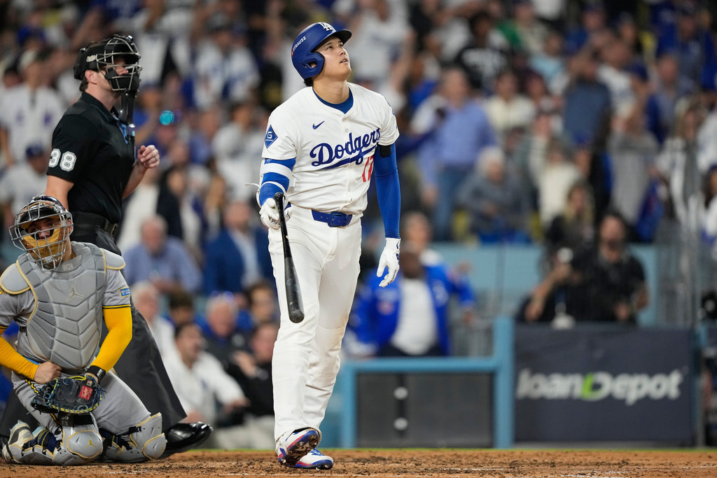 Los Angeles Dodgers' Shohei Ohtani celebrates his home run against the Milwaukee Brewers during the fourth inning in Game 4 of baseball's National League Championship Series, Friday, Oct. 17, 2025, in Los Angeles. (AP Photo/Brynn Anderson)