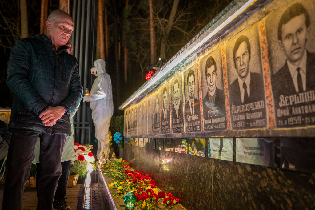 A man looks at a memorial dedicated to firefighters and workers who died after the 1986 Chornobyl (Chernobyl) nuclear disaster, ahead of its 40th anniversary in Slavutych, Ukraine, Saturday, April 25, 2026. Chornobyl is the Ukrainian name for the city. (AP Photo/Dan Bashakov)