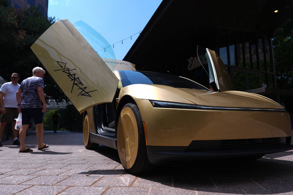 A Tesla Cybercab is displayed in downtown Austin, Texas, Thursday, Sept. 3, 2026. (AP Photo/Eric Gay)
