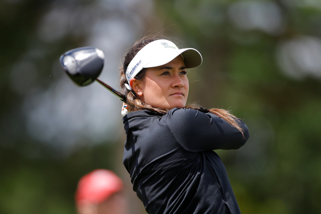 Kiara Romero watches her tee shot on the ninth hole during the first round of the Meijer LPGA Classic golf tournament, Thursday, June 18, 2026, in Belmont, Mich. (AP Photo/Al Goldis)