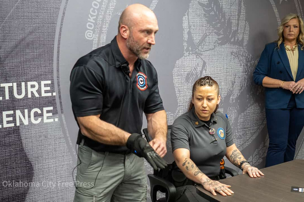 This photo provided by the Oklahoma City Free Press shows Justin Morris demonstrating the G.L.O.V.E. at the Oklahoma County Detention Center in Oklahoma City, March 22, 2023. (Brett Dickerson/Oklahoma City Free Press via AP)