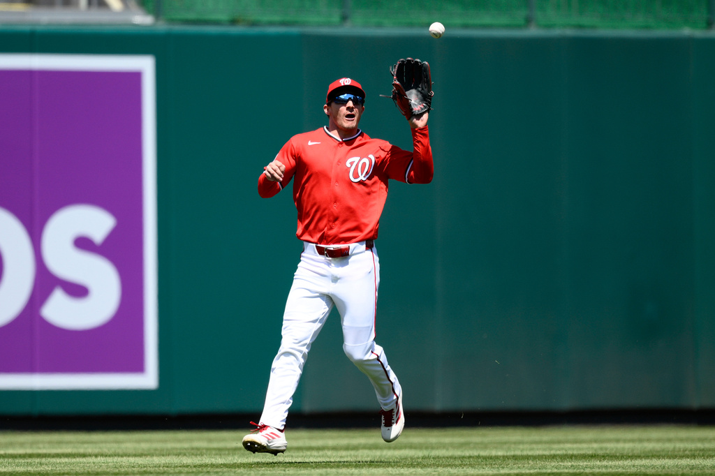 Washington Nationals center fielder Jacob Young catches a line drive hit by Milwaukee Brewers' Joey Ortiz during the third inning of a baseball game, Sunday, May 3, 2026, in Washington. (AP Photo/Nick Wass)