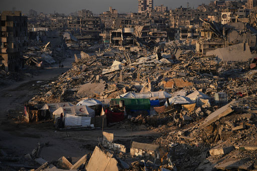 Tents for displaced Palestinians stand amid the destruction caused by the Israeli air and ground offensive in Sheikh Radwan neighborhood in Gaza City, Wednesday, Oct. 22, 2025. (AP Photo/Abdel Kareem Hana) Tents for displaced Palestinians stand amid the destruction caused by the Israeli air and ground offensive in Sheikh Radwan neighborhood in Gaza City, Wednesday, Oct. 22, 2025. (AP Photo/Abdel Kareem Hana)