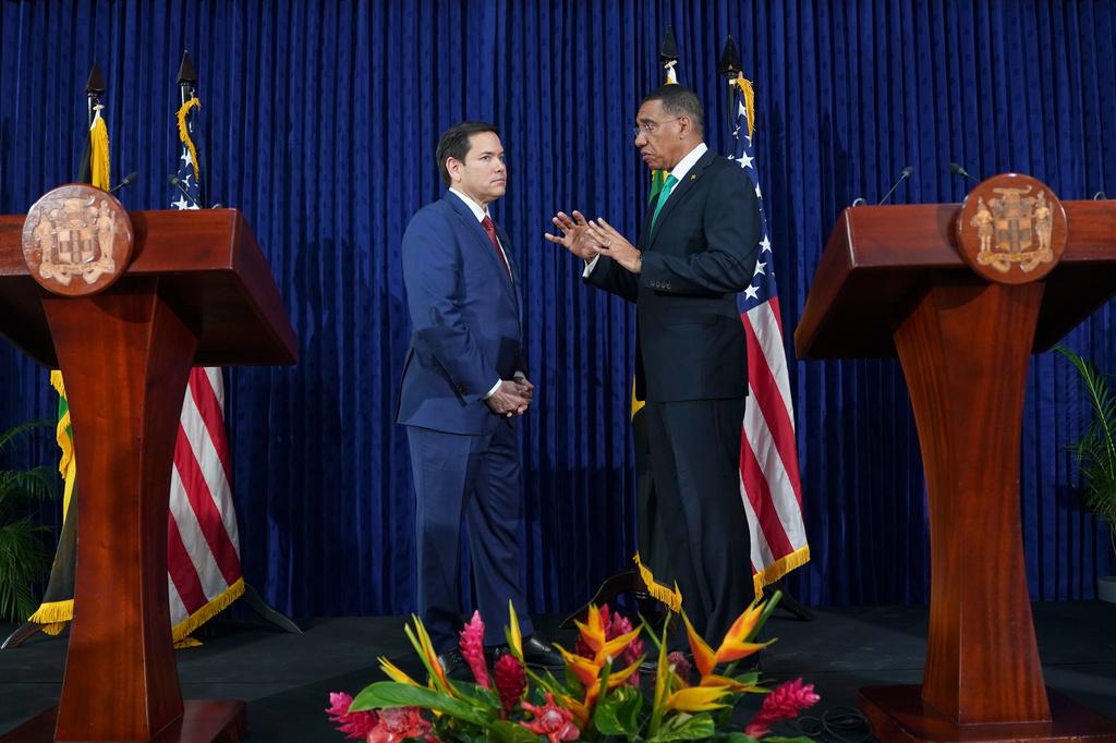 FILE - U.S. Secretary of State Marco Rubio, left, and Jamaica's Prime Minister Andrew Holness speak after giving a joint news conference at the office of the prime minister in Kingston, Jamaica, March 26, 2025. (Nathan Howard/Pool Photo via AP, File)