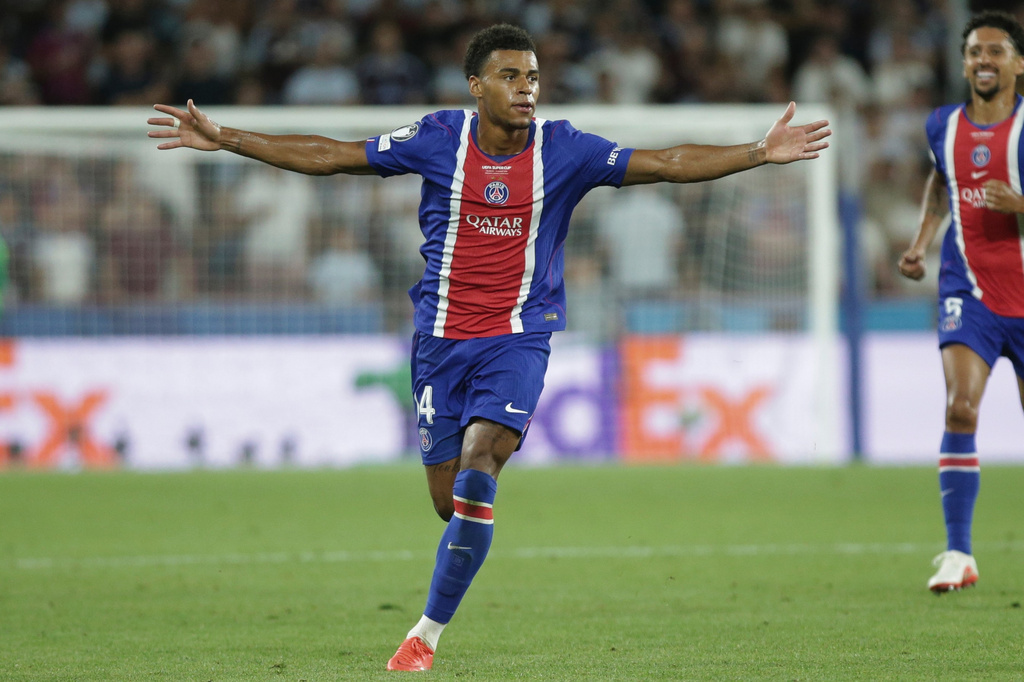 PSG's Desire Doue celebrates after scoring his side's second goal during the UEFA Super Cup soccer match between Paris Saint-Germain and Aston Villa in Salzburg, Austria, Wednesday, Aug. 12, 2026. (AP Photo/Heinz-Peter Bader)