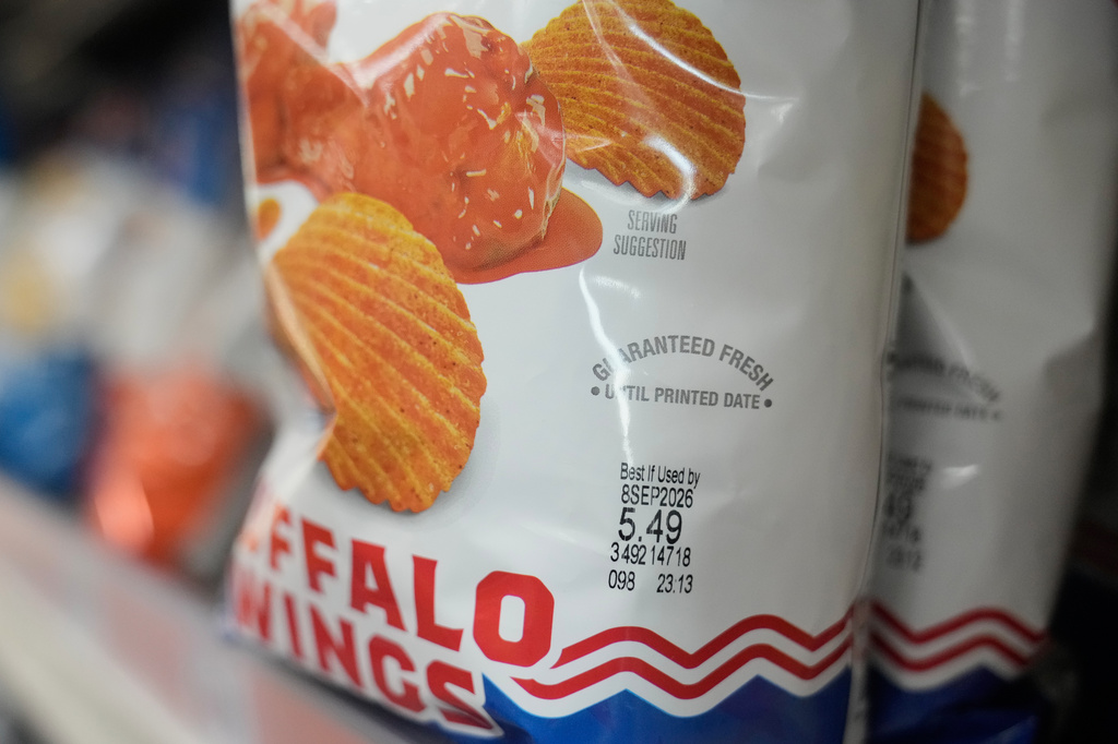 A Best If Used By date is stamped on a package of potato chips displayed at Park Plaza Fine Foods, Tuesday, June 30, 2026, in San Francisco. (AP Photo/Jeff Chiu)