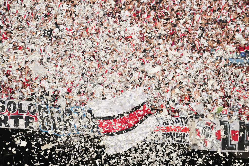 River Plate fans throw paper and confetti as their team enters the field for an Argentine league match against Boca Juniors in Buenos Aires, Argentina, Sunday, April 19, 2026. (AP Photo/Rodrigo Abd)