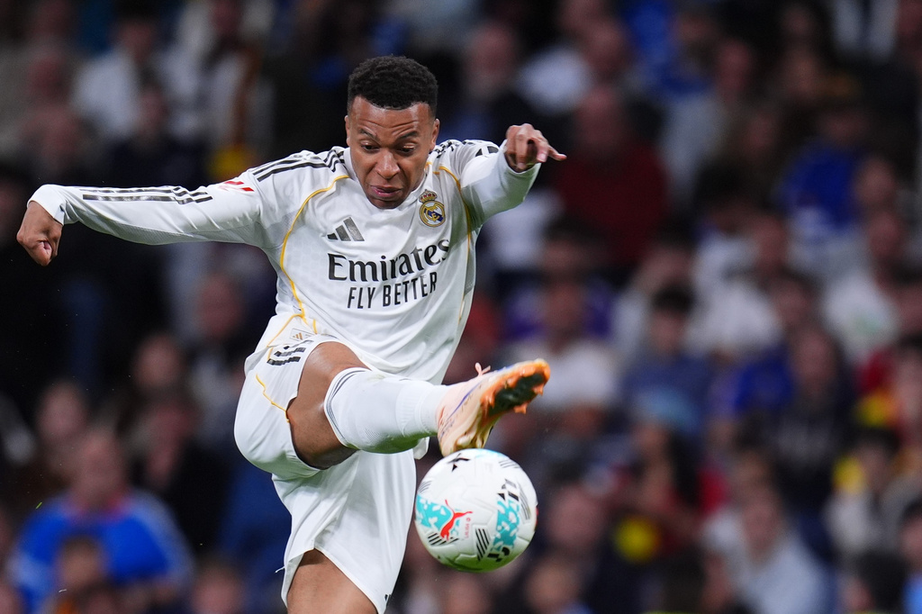 Real Madrid's Kylian Mbappe kicks the ball during the Spanish La Liga soccer match between Real Madrid and Real Oviedo in Madrid, Spain, Thursday, May 14, 2026. (AP Photo/Manu Fernandez)