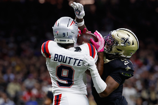 New England Patriots wide receiver Kayshon Boutte, left, catches a pass for a touchdown against New Orleans Saints cornerback Kool-Aid McKinstry during the first half of an NFL football game, Sunday, Oct. 12, 2025, in New Orleans. (AP Photo/Butch Dill) New England Patriots wide receiver Kayshon Boutte, left, catches a pass for a touchdown against New Orleans Saints cornerback Kool-Aid McKinstry during the first half of an NFL football game, Sunday, Oct. 12, 2025, in New Orleans. (AP Photo/Butch Dill)
