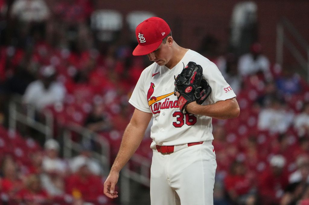 St. Louis Cardinals starting pitcher Michael McGreevy pauses after giving up an RBI single to Texas Rangers' Joc Pederson during the fifth inning of a baseball game Monday, June 1, 2026, in St. Louis. (AP Photo/Jeff Roberson)