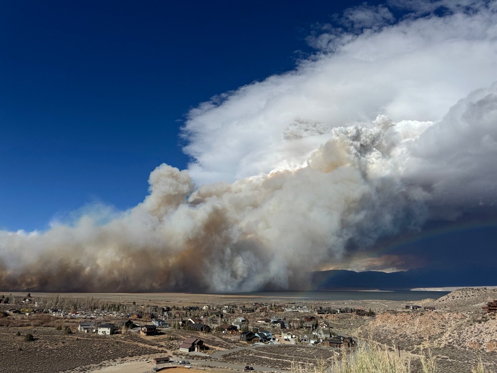 This image released by the Mammoth Lakes Police Department shows the Pack Fire burning on Thursday, Nov. 13, 2025, in Mono County, Calif. (Mammoth Lakes Police Department via AP)