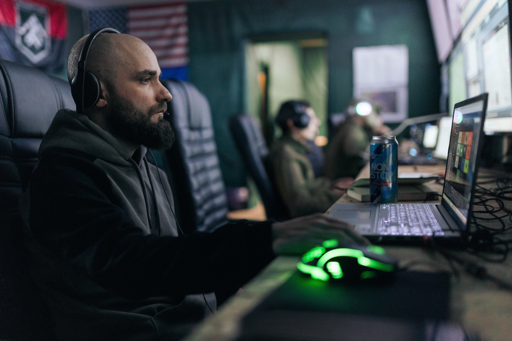 Soldiers from Ukraine's Khartia brigade operate drones from the Kharkiv region, Ukraine, Feb. 30, 2026. (AP Photo/Nikoletta Stoyanova)