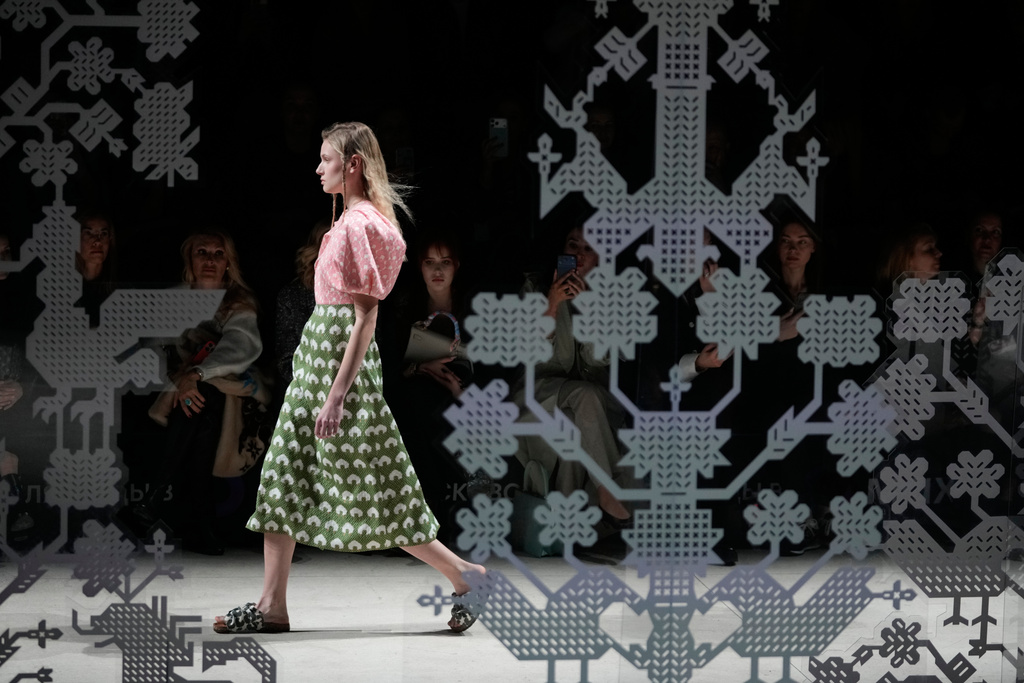 A model wears a creation by Russian designer Alena Akhmadullina on a runway at the Moscow Fashion Week in Moscow, Saturday, March 14, 2026. (AP Photo/Pavel Bednyakov)