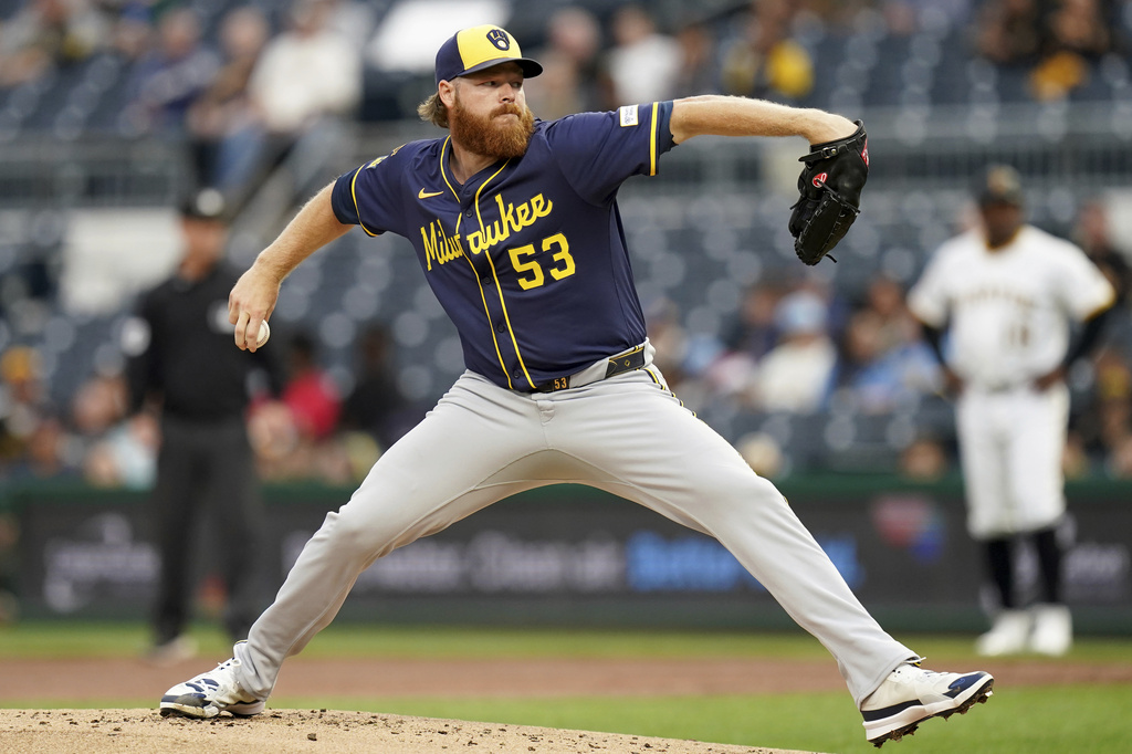 Milwaukee Brewers pitcher Brandon Woodruff delivers during the first inning of a baseball game against the Pittsburgh Pirates, Saturday, Sept. 6, 2025, in Pittsburgh. (AP Photo/Matt Freed)
