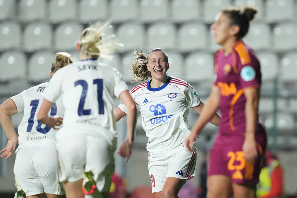 Valerenga's Stine Brekken, center, celebrates after scoring during the women's Champions League soccer match between Roma and Valerenga, in Rome, Tuesday, Nov. 11, 2025. (Alfredo Falcone/LaPresse via AP)