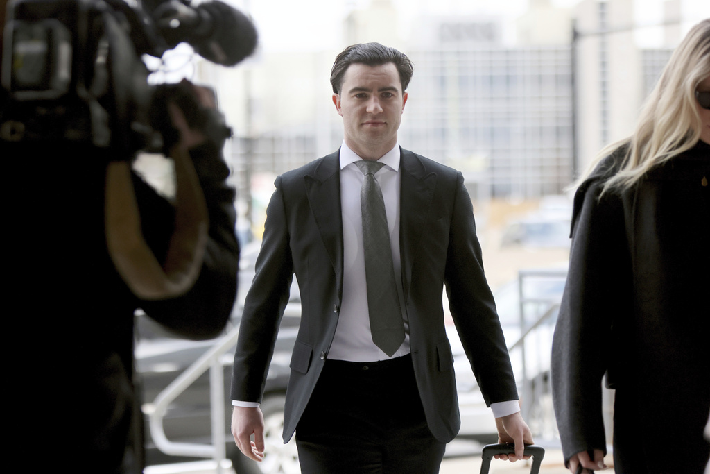 FILE - Hockey player Dillon Dube arrives at the London Courthouse in London, Ontario, Wednesday, April 23, 2025. (Nicole Osborne/The Canadian Press via AP, File)