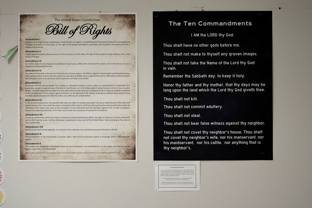 Ten Commandments and Bill of Rights posters are displayed in a classroom at Lehman High School, in Kyle, Texas, Thursday, Oct. 16, 2025. (AP Photo/Eric Gay)