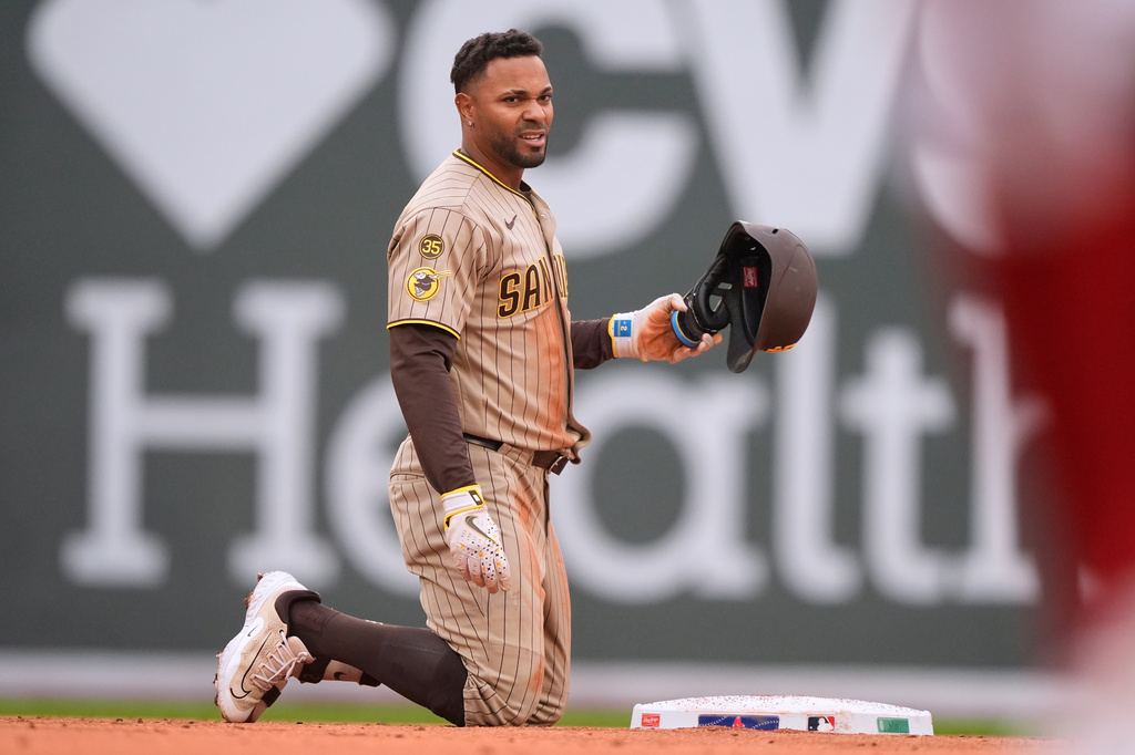 San Diego Padres shortstop Xander Bogaerts (2) reacts after being tagged out after trying to advance to second base during the second inning of a baseball game against the Boston Red Sox, Sunday, April 5, 2026, in Boston. (AP Photo/Robert F. Bukaty)