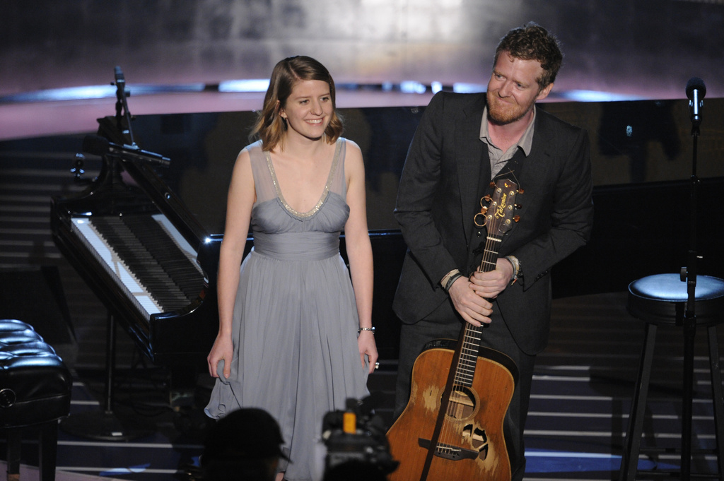 FILE - Marketa Irglova, left, and Glen Hansard appear after performing during the 80th Academy Awards in Los Angeles on Feb. 24, 2008. (AP Photo/Mark J. Terrill, File)