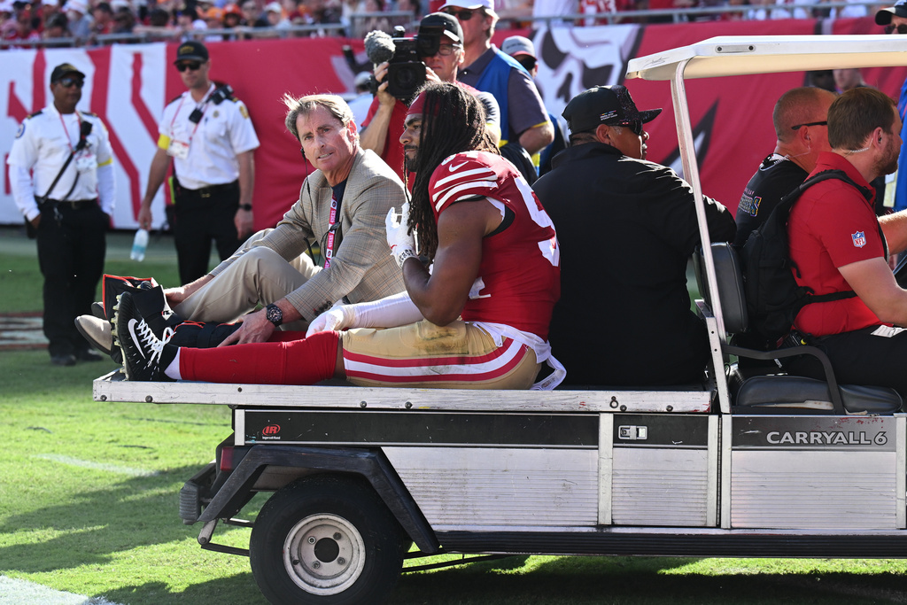 FILE - San Francisco 49ers middle linebacker Fred Warner is carted off the field during the first half of an NFL football game against the Tampa Bay Buccaneers in Tampa, Fla., Oct. 12, 2025. (AP Photo/Jason Behnken, File)