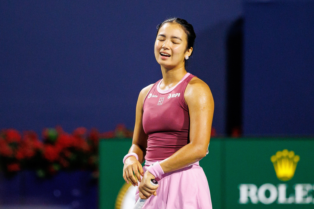 Alexandra Eala, of the Philippines, reacts during a match against Belinda Bencic, of Switzerland, during a round of 16 match at the National Bank Open tennis tournament in Toronto, on Sunday, Aug. 9, 2026. (Keito Newman/The Canadian Press via AP)