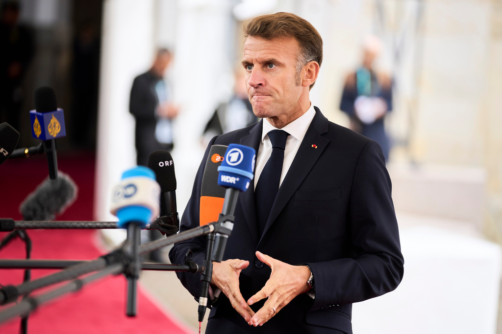 French President Emmanuel Macron arrives at an informal summit in the Danish parliament at Christiansborg Castle in Copenhagen, Wednesday, Oct. 1, 2025. (Thomas Traasdahl/Ritzau Scanpix via AP)