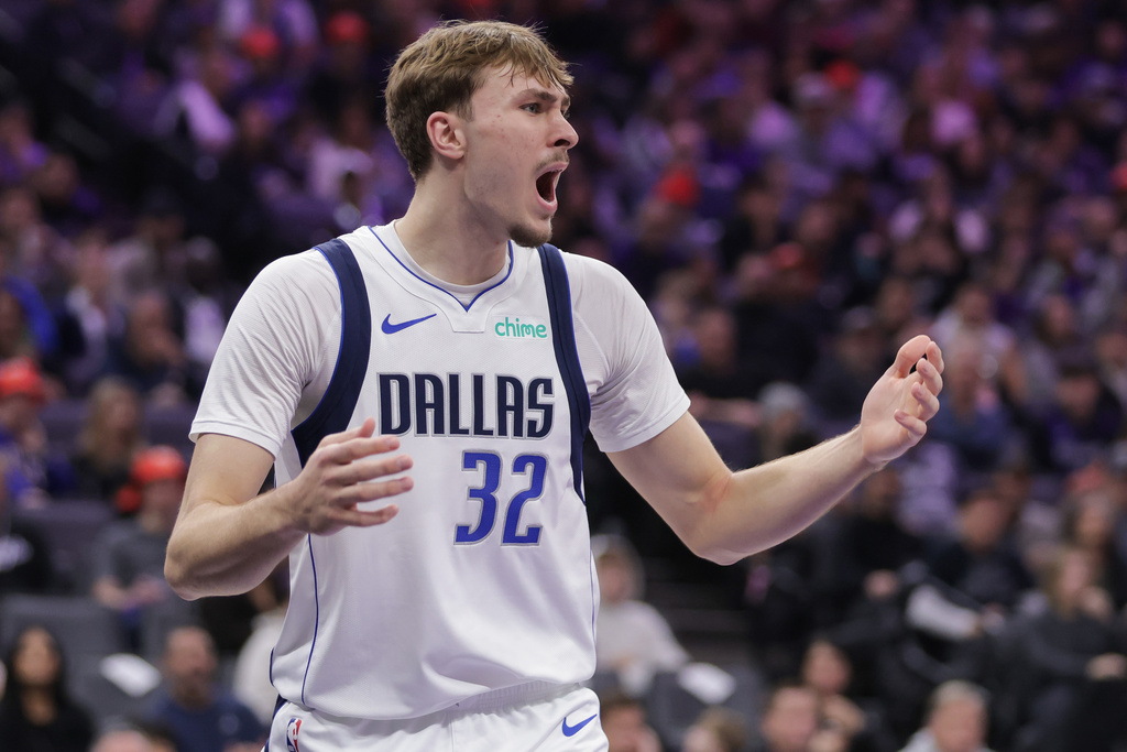 Dallas Mavericks forward Cooper Flagg reacts after being called for a foul during the first half of an NBA basketball game against the Sacramento Kings, Saturday, Dec. 27, 2025, in Sacramento, Calif. (AP Photo/Scott Marshall)