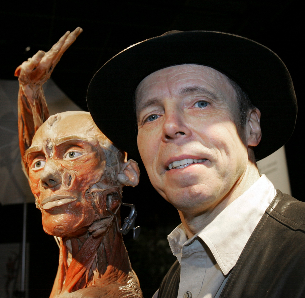 FILE - German Gunther von Hagens poses with a display from "Body Worlds" anatomy exhibit that puts real human specimens on show in Dallas, Texas, Jan. 23, 2007. (AP Photo/LM Otero, File)