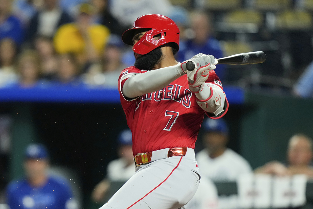 Los Angeles Angels' Jo Adell watches his RBI single during the eighth inning of a baseball game against the Kansas City Royals, Wednesday, Sept. 3, 2025, in Kansas City, Mo. (AP Photo/Charlie Riedel)