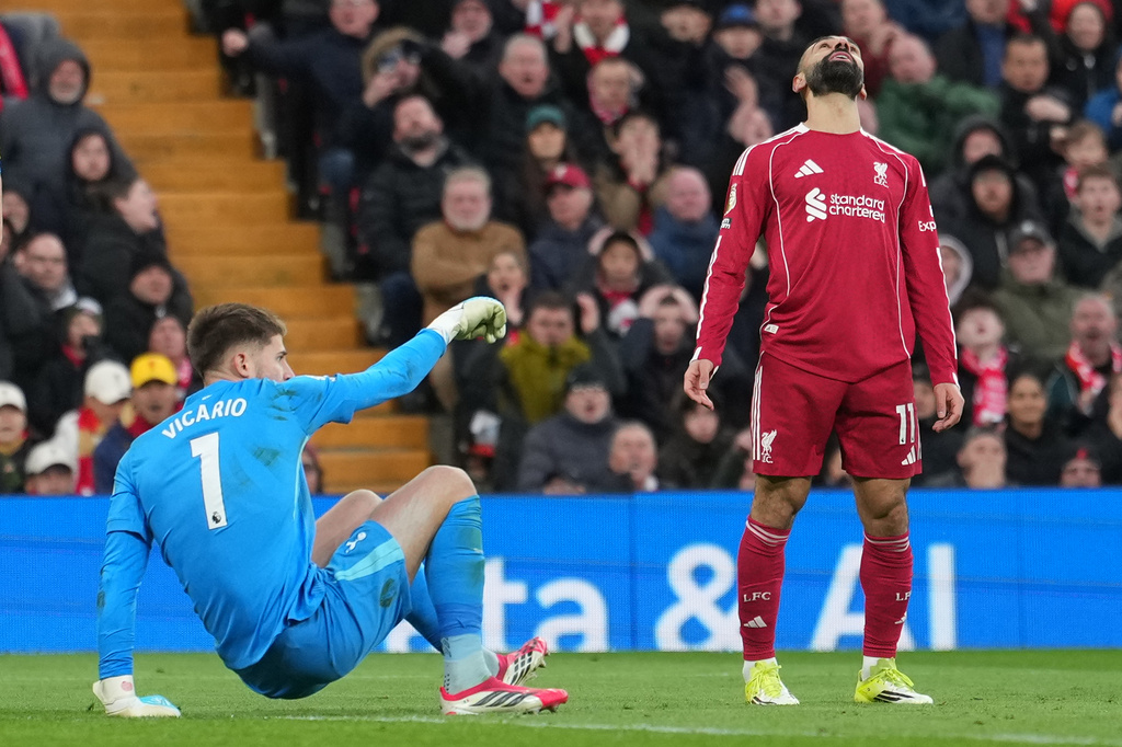 Liverpool's Mohamed Salah reacts during the Premier League soccer match between Liverpool and Tottenham in Liverpool, England, Sunday, March 15, 2026. (AP Photo/Jon Super)