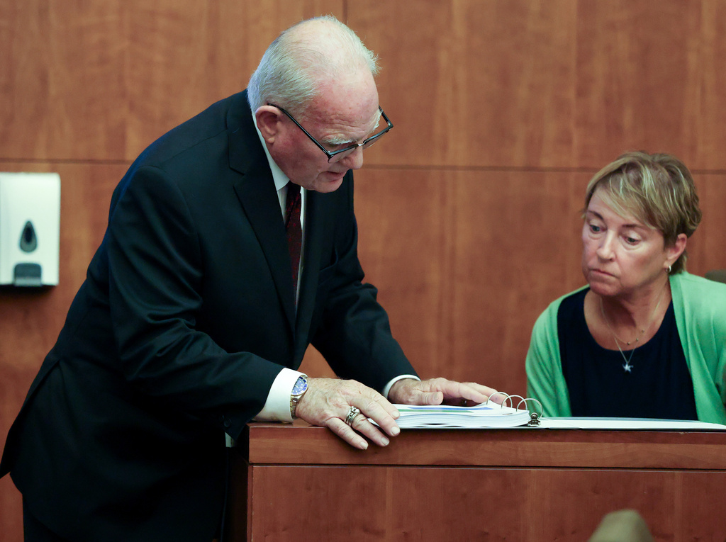 Defense Attorney Kevin Reddington, speaks with Susan Clancy, the former mother in law of Lindsay Clancy, during her testimony at Clancy's murder trial in Plymouth Mass., Tuesday Aug. 18, 2026 in Plymouth, Mass. (Jonathan Wiggs/The Boston Globe via AP, Pool)