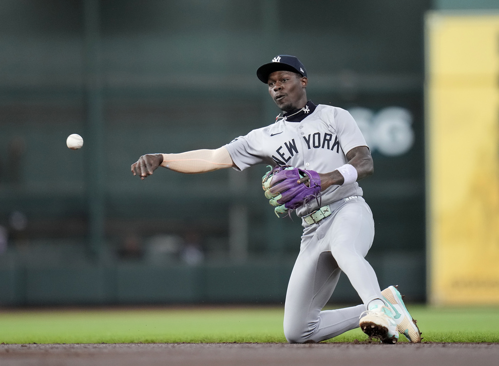 New York Yankees' second baseman Jazz Chisholm Jr. makes the throw to first base as Houston Astros' Ramon Urias ground out during the second inning of a baseball game Thursday, Sept. 4, 2025, in Houston. (AP Photo/Karen Warren)